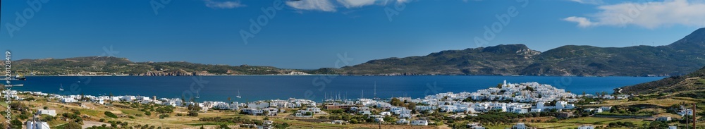 Panoramic view of Plaka village with traditional Greek church. Milos island, Greece