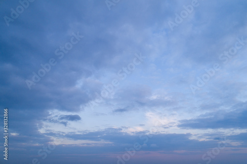 Beautiful sky with stretched clouds during twilight. © LALSSTOCK