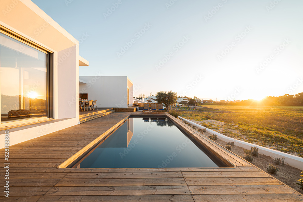Modern villa with pool and deck - obrazy, fototapety, plakaty 