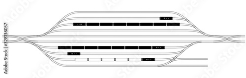 A railway station with many paths and arrow transfers. Trains from locomotives and carriages. Logistics or supply, transportation of goods by land.