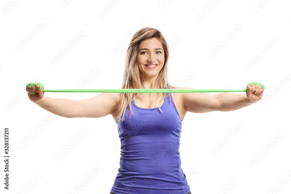 Smiling woman exercising with a stretching band Smiling woman exercising with a stretching band