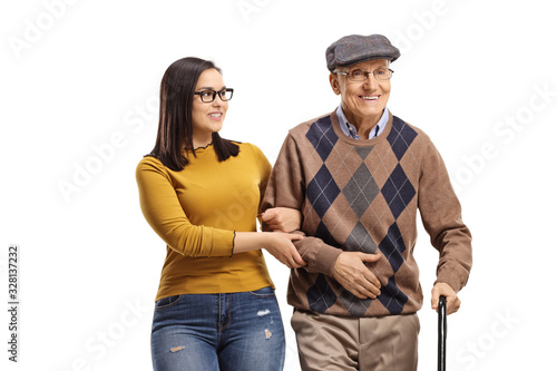 Young woman helping a senior man with a walking cane