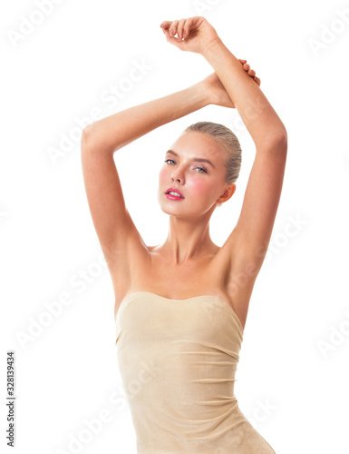 Beautiful young woman holding her arms up and showing clean underarms. Armpit's care. Armpit epilation, hair removal, perfect skin. © Svetlana Fedoseeva