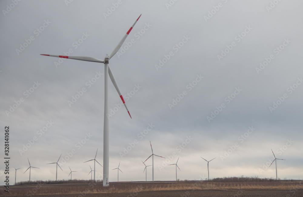 Windmills with cloudy weather and gloomy clouds Windmills with cloudy weather and gloomy clouds