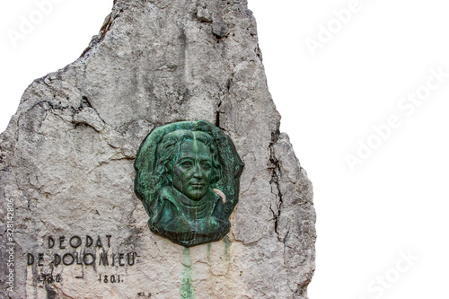 Cortina d'Ampezzo, Italy. 2010. Monument in honour of the French geologist Déodat Gratet de Dolomieu, Dolomites against white background photo