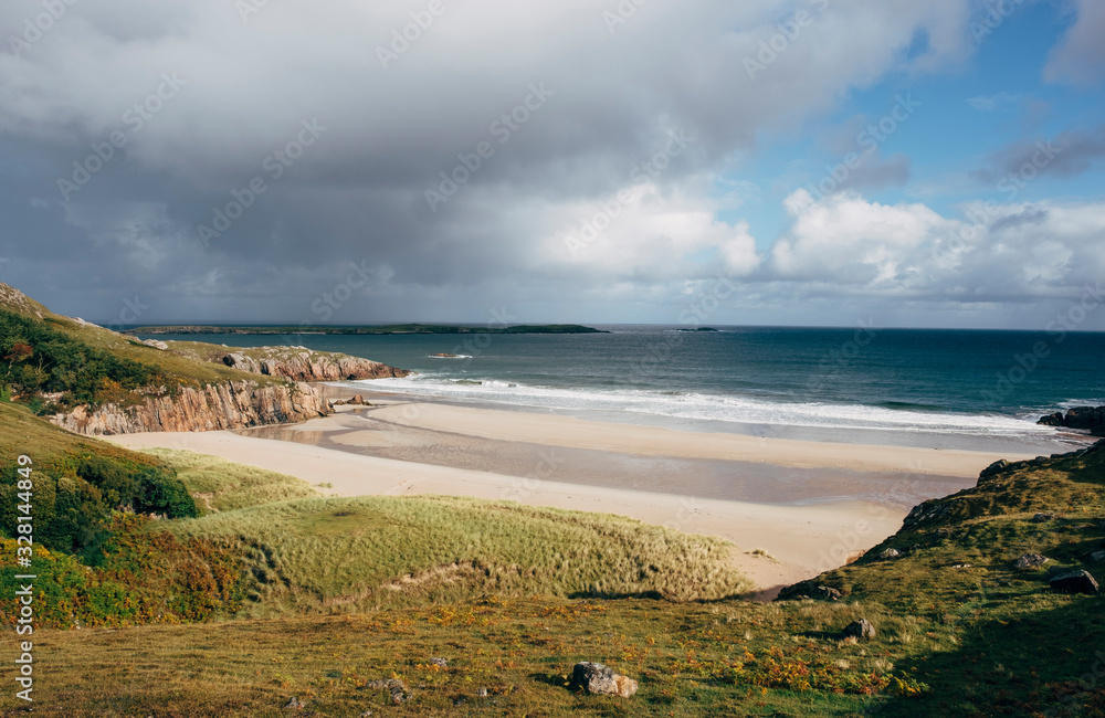 Small, remote white sand beach off the North Coast of Scotland, UK. Small, remote white sand beach off the North Coast of Scotland, UK.
