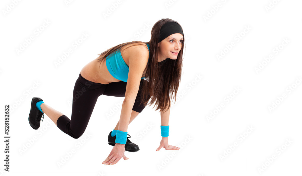 Female athlete ready to run isolated on a white background Female athlete ready to run isolated on a white background