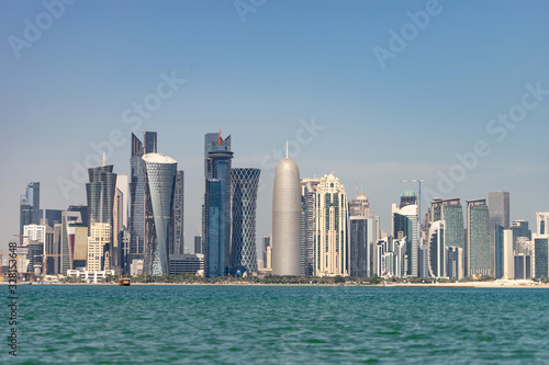 View of city center with skyscrapers from the other side of sea in Doha, Qatar