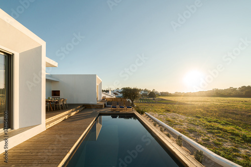 Modern villa with pool and deck © Luis Viegas