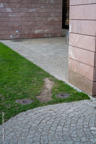 Path along a wall to shorten the way