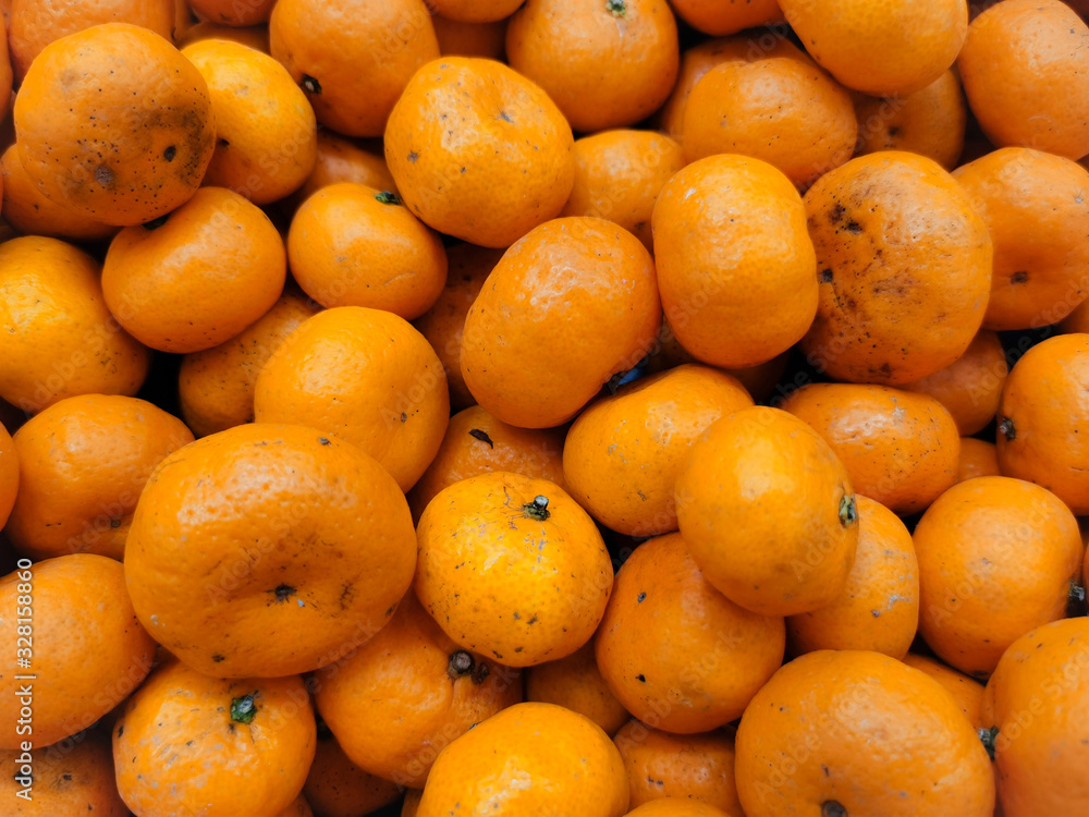 Beautiful texture fresh lemon orange lime tangerine and grapefruit background, fruit orange pattern Beautiful texture fresh lemon orange lime tangerine and grapefruit background, fruit orange pattern