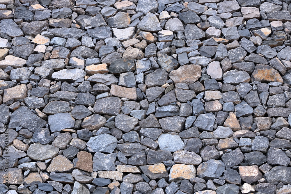 Texture of a grey granite stone wall for background Texture of a grey granite stone wall for background