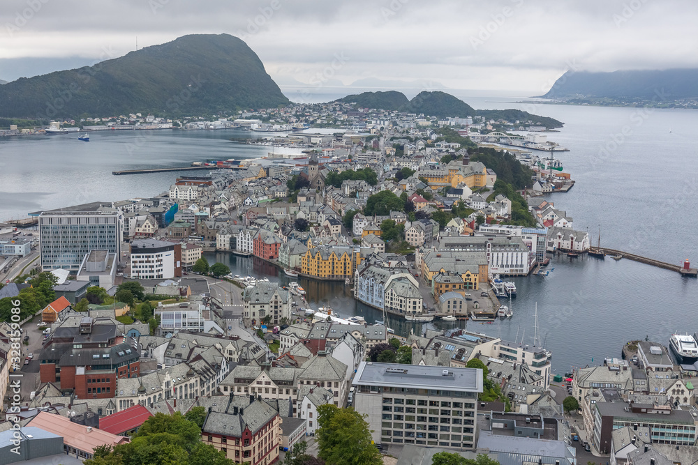 Alesund, Norway - June 12, 2016: Norway, Alesund town panoramic view, Norwegian fjords. View from the mountain Aksla at the city of Alesund. selective focus