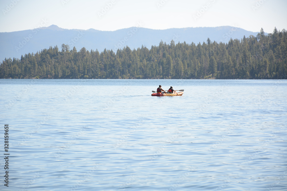 SOUTH LAKE TAHOE, CALIFORNIA, USA - AUGUST 21, 2019: Kayaking at Emerald Bay on Tahoe Lake SOUTH LAKE TAHOE, CALIFORNIA, USA - AUGUST 21, 2019: Kayaking at Emerald Bay on Tahoe Lake