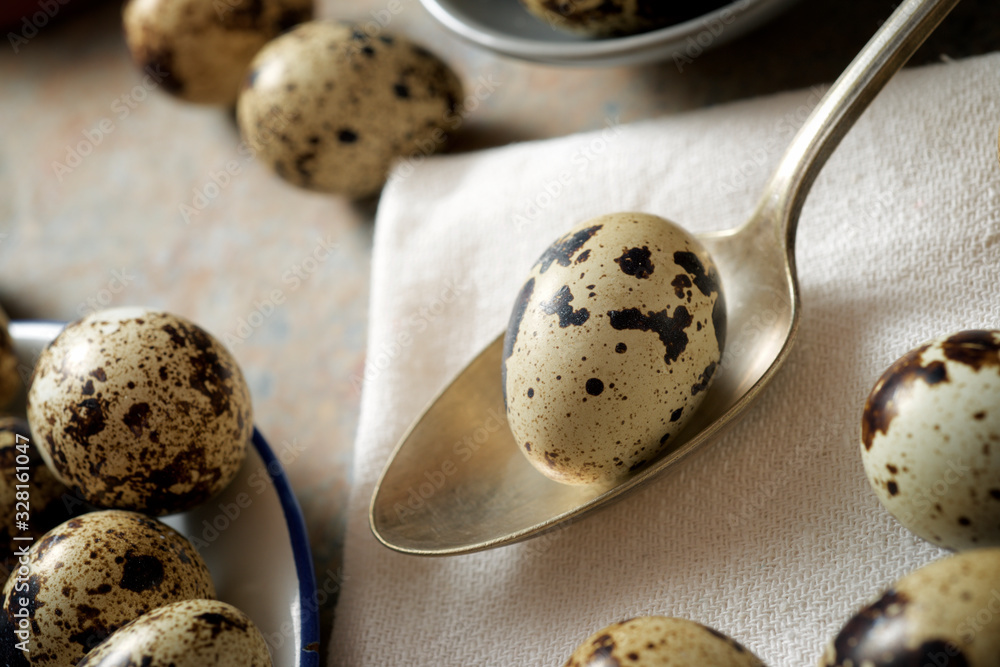 Quail eggs on a stone table. Quail eggs on a stone table.