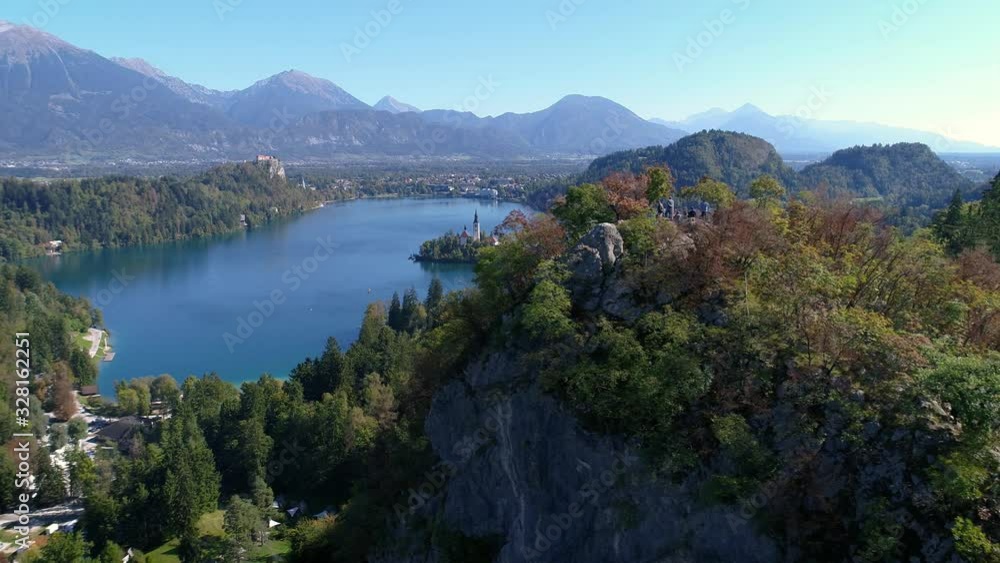 aerial view of a beautiful landscape in Bled, Slovenia. Famous lake with church in the background. aerial view of a beautiful landscape in Bled, Slovenia. Famous lake with church in the background.