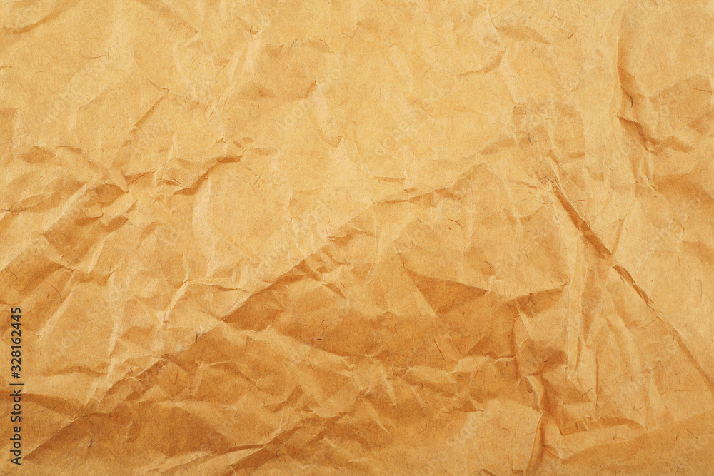 Fototapeta premium Brown crumpled paper background