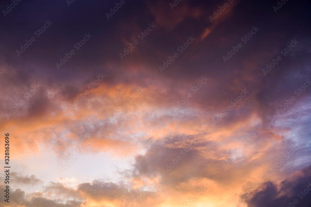 yellow and orange clouds at sunset. dramatic sky skyline background yellow and orange clouds at sunset. dramatic sky skyline background
