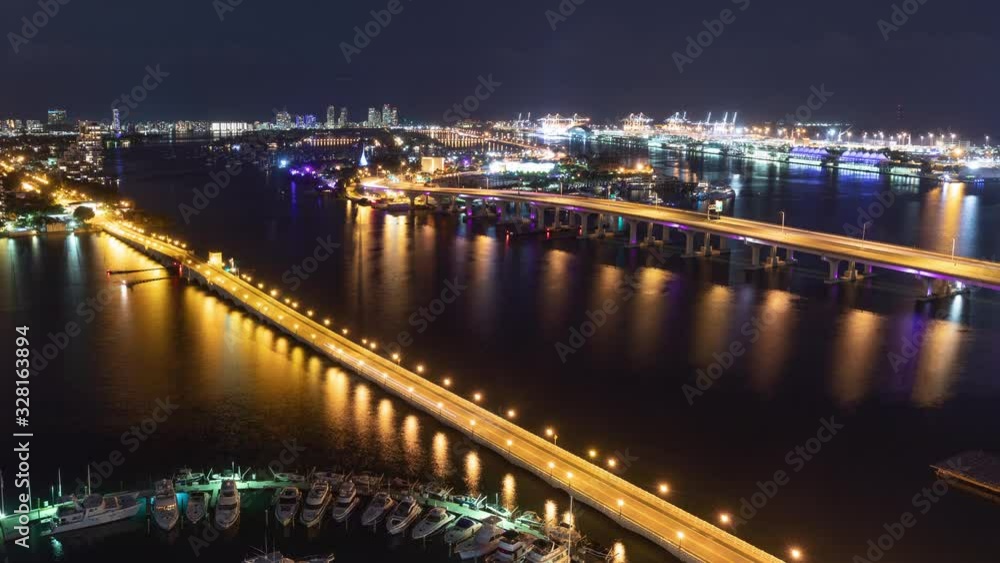 Night time lapse of traffic going over two of the bridges to Miami Beach Florida Night time lapse of traffic going over two of the bridges to Miami Beach Florida