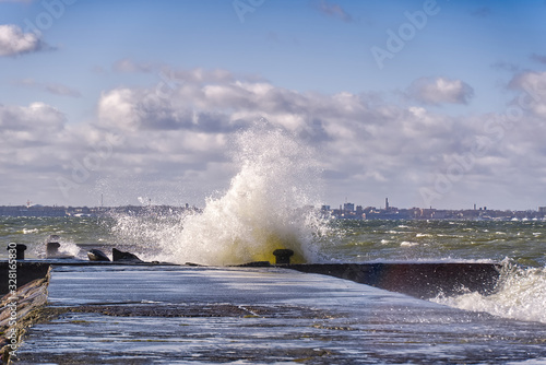 Storm at baltic sea. big waves over berth