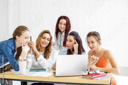A group of marketers discuss a customer’s assignment. The concept of brainstorming, business, work on result and success.