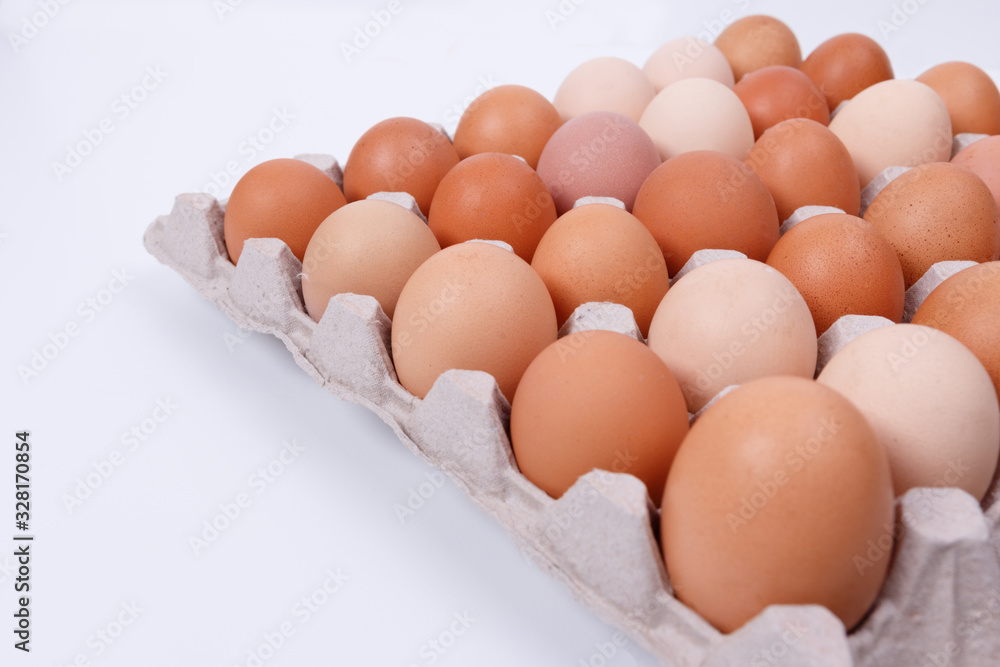 Chicken egg in a paper container. Isolate Chicken egg in a paper container. Isolate