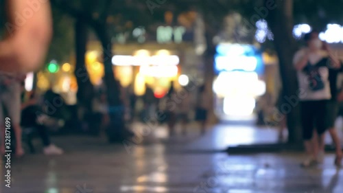 Unrecogniable people on the street of Hanoi, Vietnam.