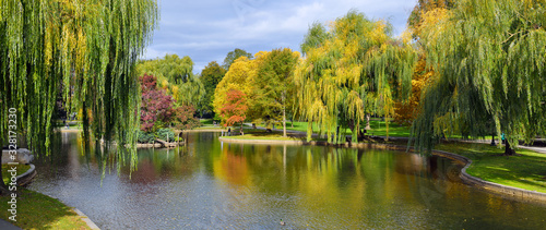Panoramic view of Boston Public Garden lagoon in the fall photo