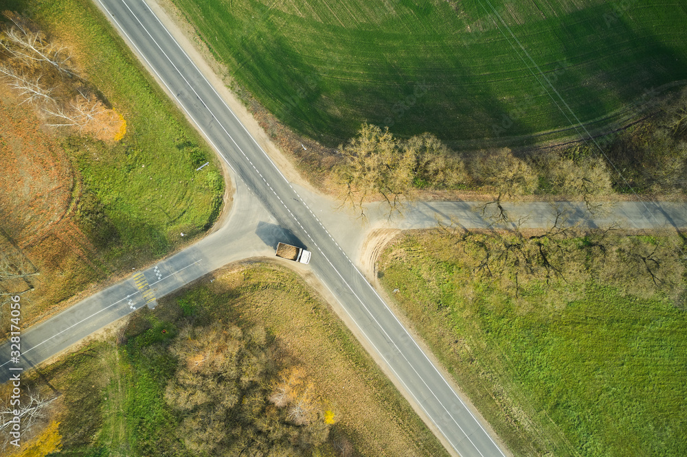 Aerial. Traffic motion on a country  road.