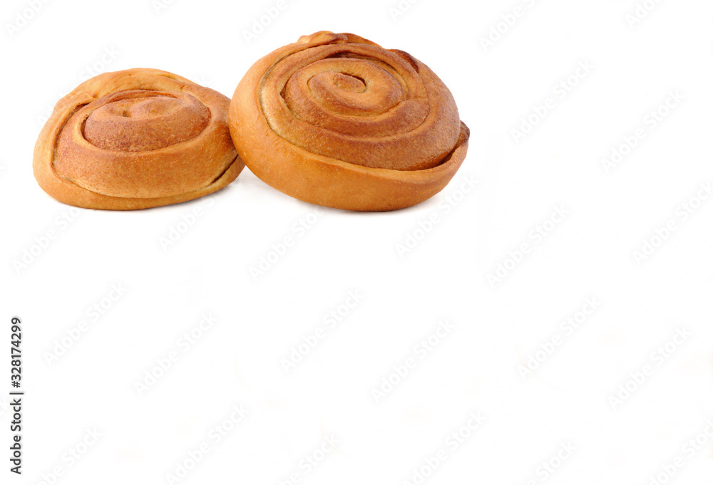 Two bread pastry swirls on a white background Two bread pastry swirls on a white background
