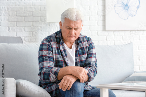 Senior man suffering from P...