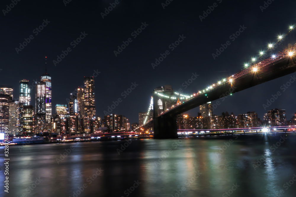 Gorgeous view of the Brooklyn Bridge and the Manhattan's skyline at night.