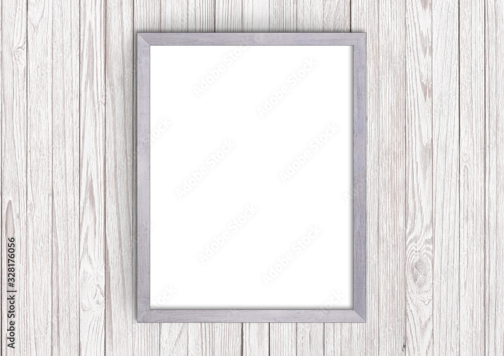 Empty frame. Blank light grey portrait frame on white wood panel wall Empty frame. Blank light grey portrait frame on white wood panel wall