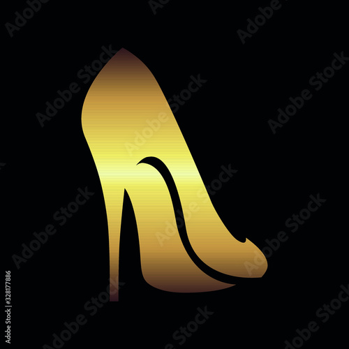 Abstract gold high heel shoe symbol on black backdrop. Design element