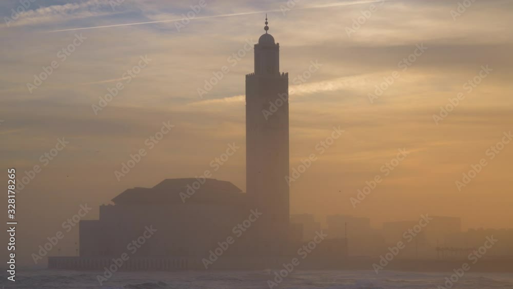 view of Hassan II Mosque At sunrise- Casablanca, Morocco view of Hassan II Mosque At sunrise- Casablanca, Morocco