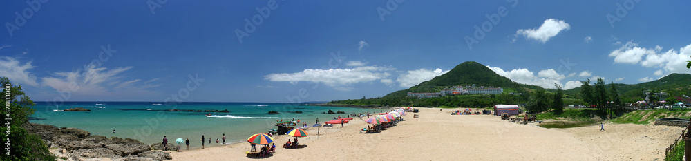 People playing on the Kenting beach People playing on the Kenting beach