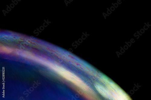 Fototapeta Naklejka Na Ścianę i Meble -  abstract colorful soap bubble with black background