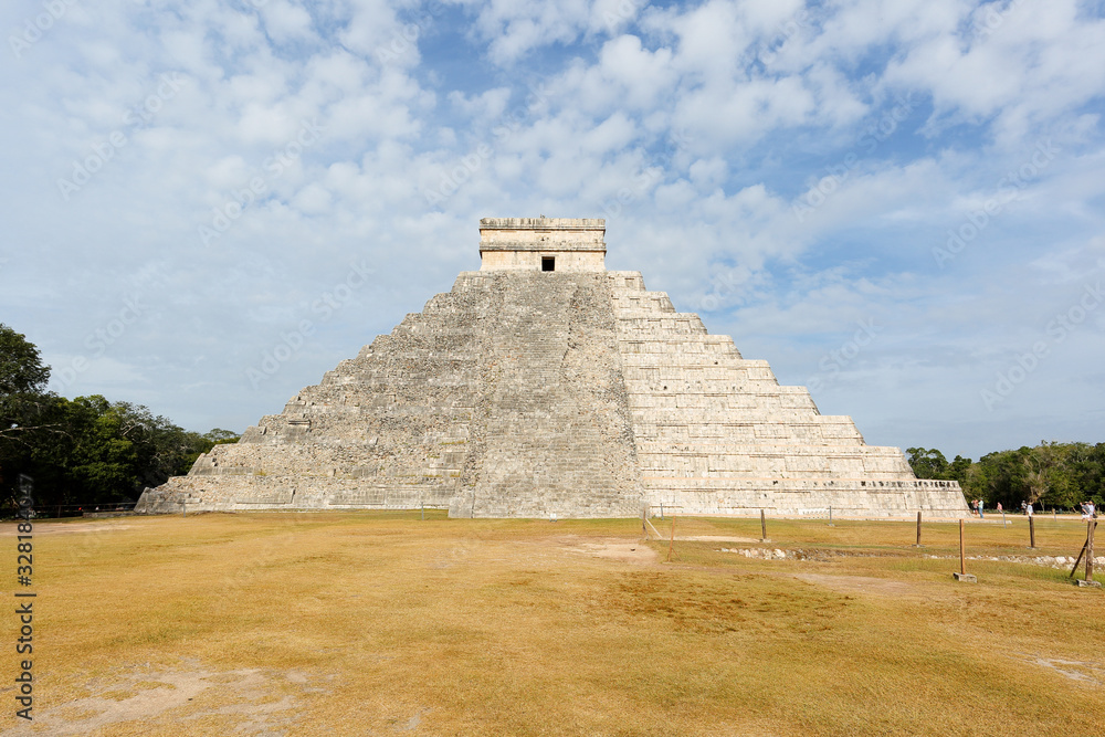 A massive step pyramid known as El Castillo at Chichen, Mexico