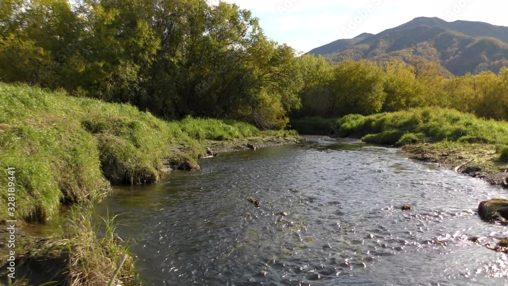 A small stream near the place of the confluence of the river. A small stream near the place of the confluence of the river.