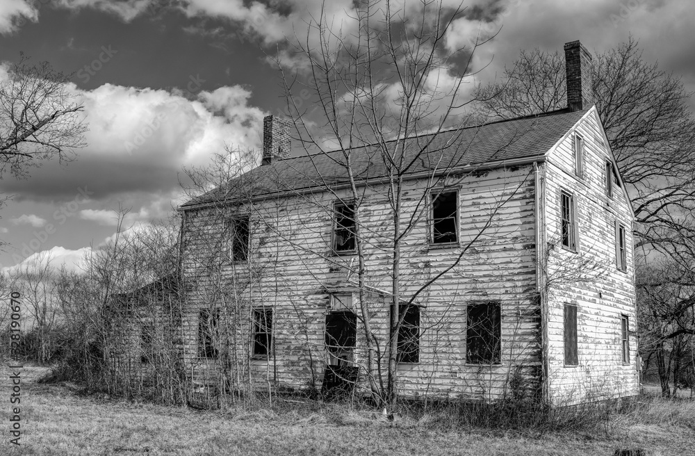 Black and white photograph of an abandoned haunted farm house of Six Mile Run, New Jersey. Black and white photograph of an abandoned haunted farm house of Six Mile Run, New Jersey.