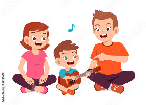 happy cute family mom dad son daughter play guitar