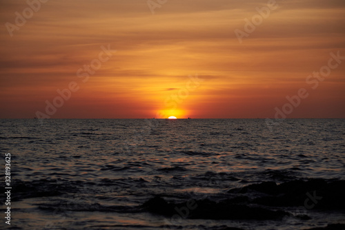 Sunset in the sea and beautiful sky © Teeradej
