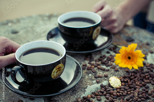 cup of coffee with beans