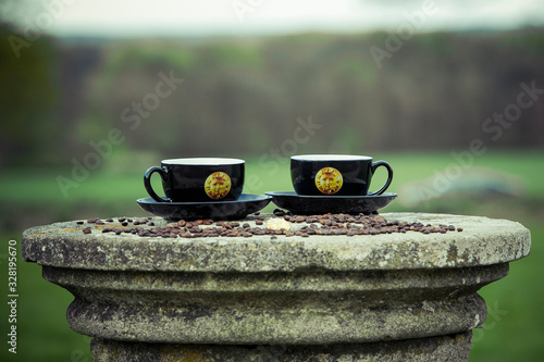 Couple cup of coffee with beans