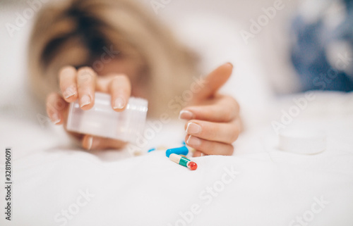 Woman pills bed