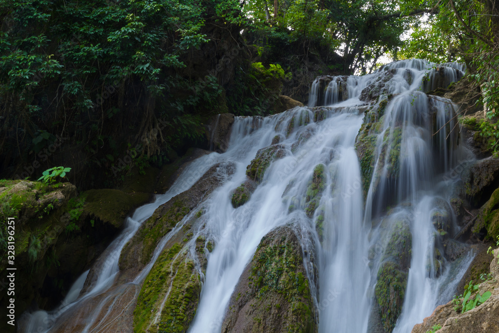 Beautiful view the Waterfalls on of Tamasopo san luis potosi mexico on sunset Beautiful view the Waterfalls on of Tamasopo san luis potosi mexico on sunset