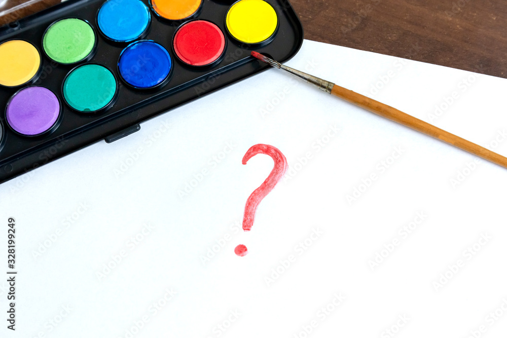 Handwritten question mark with brush and watercolor paints on white ...