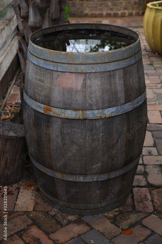 Rustic old wine barrel used as decoration in a Sydney NSW Australia Park Rustic old wine barrel used as decoration in a Sydney NSW Australia Park