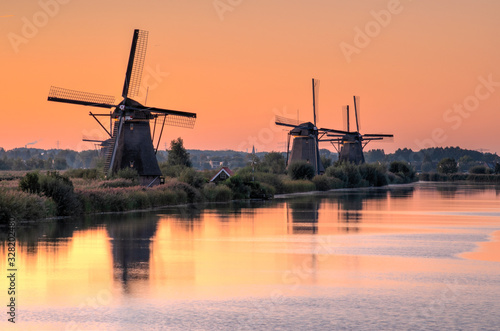 Netherlands rural landscape with windmills at famous tourist site Kinderdijk