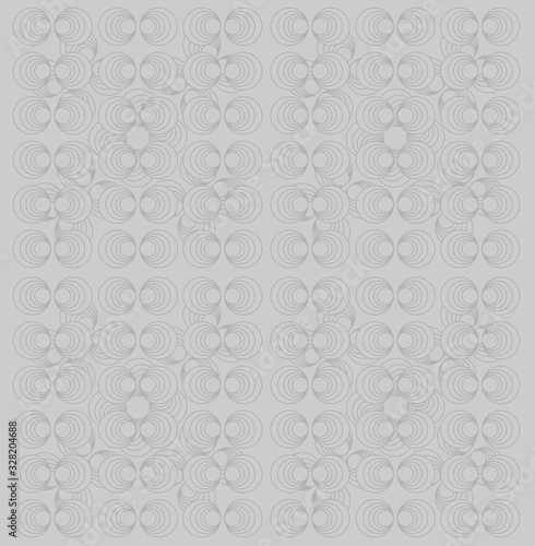 Circular lined pattern in dark grey color on grey background. abstack geometry pattern.